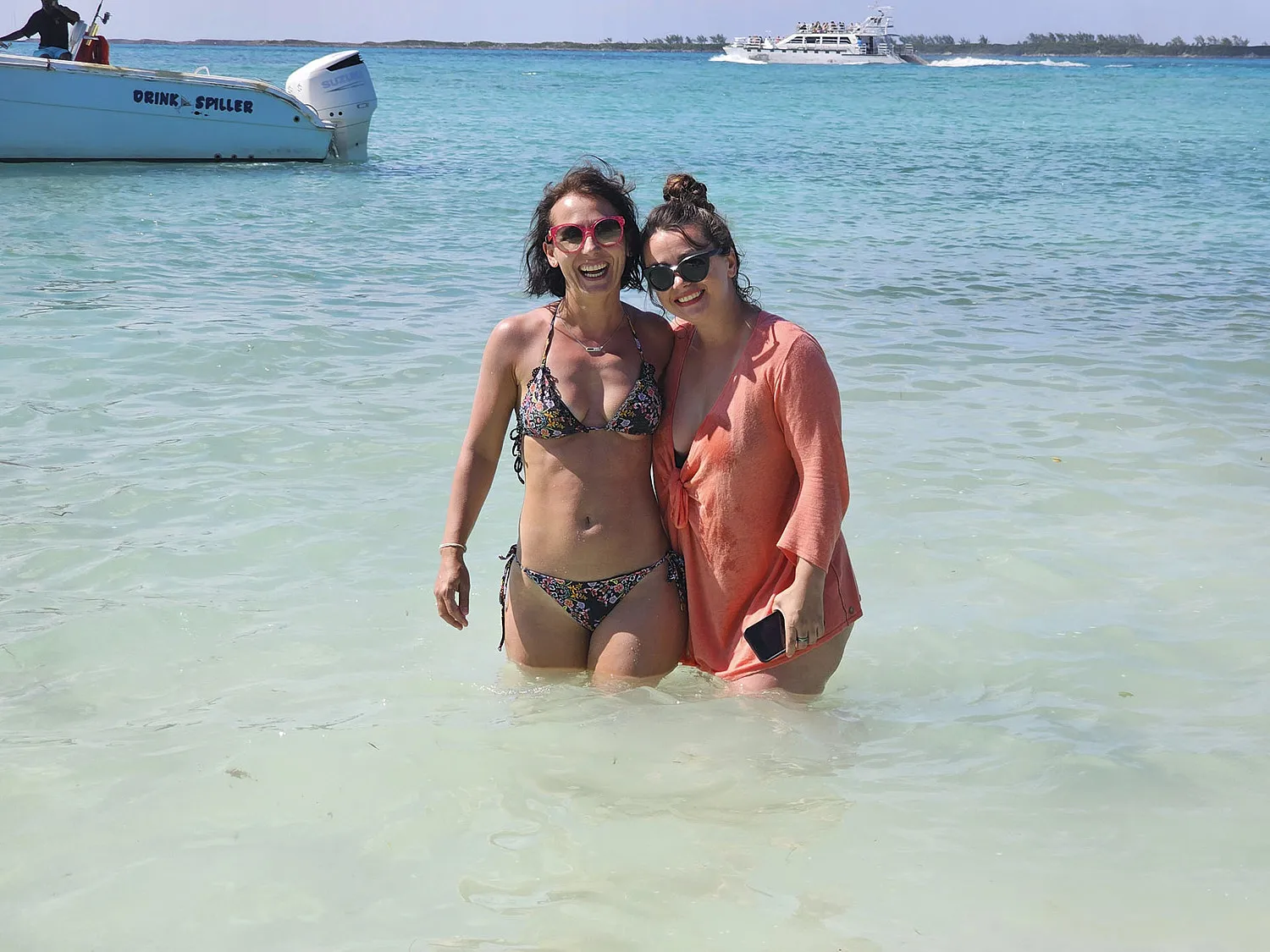 Women smiling in water