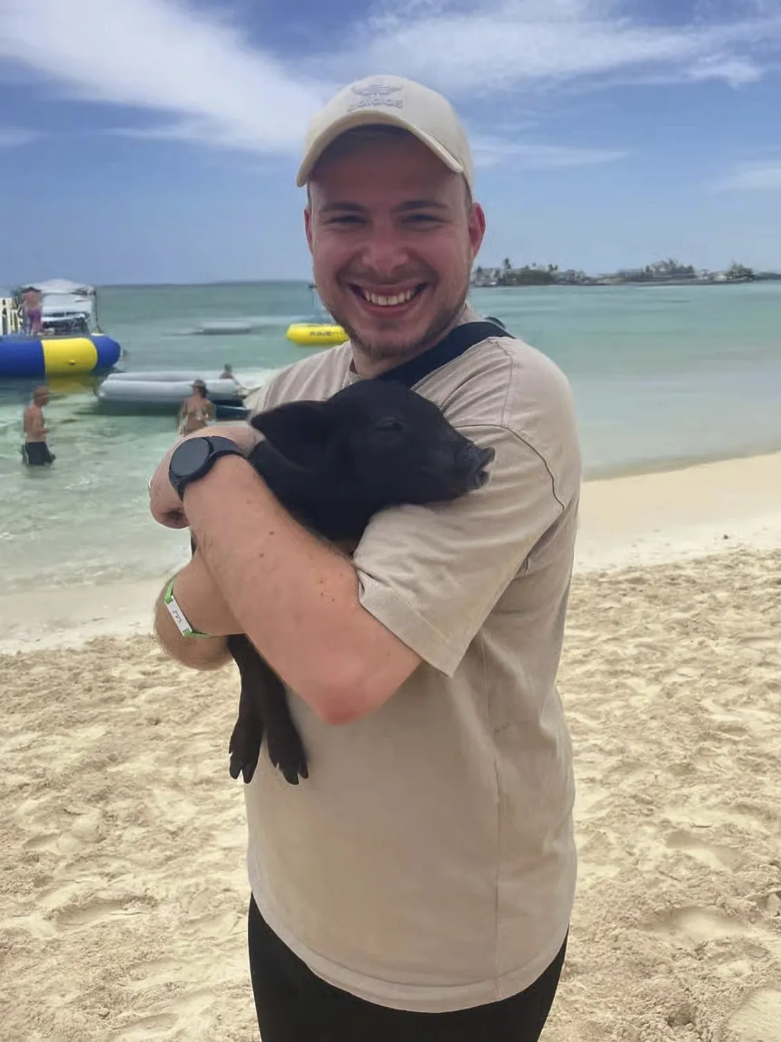 Guy with a piglet